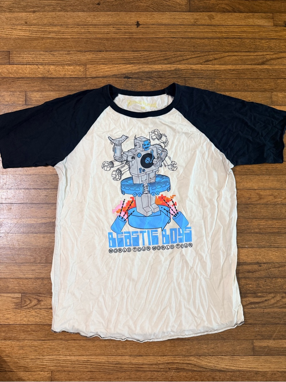 Rowdy Sprout White Tee with Black Trim and Blue Robot Graphic